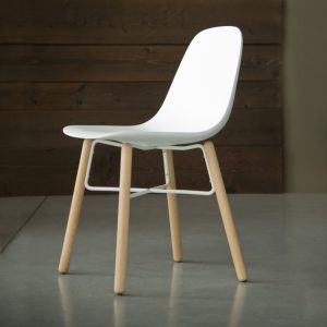 Jane Hamley Wells BABETTE_BABW_A modern café restaurant side chair molded polyurethane seat on wood legs with contrasting metal stretchers
